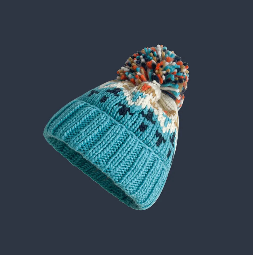Women's Snowflake Pattern Knit Pom Beanie | Soft Stretch Knit, Fluffy Pom-Pom Top, One-Size Snug Fit | 5 Colors