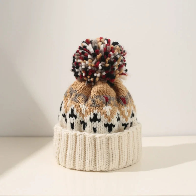Women's Snowflake Pattern Knit Pom Beanie | Soft Stretch Knit, Fluffy Pom-Pom Top, One-Size Snug Fit | 5 Colors
