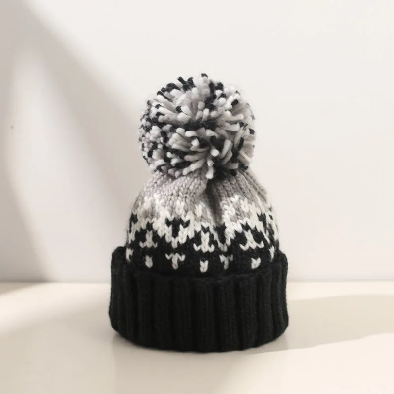 Women's Snowflake Pattern Knit Pom Beanie | Soft Stretch Knit, Fluffy Pom-Pom Top, One-Size Snug Fit | 5 Colors