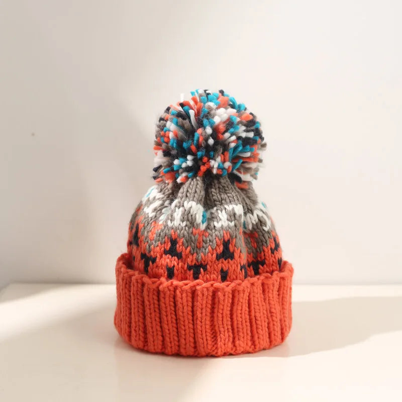 Women's Snowflake Pattern Knit Pom Beanie | Soft Stretch Knit, Fluffy Pom-Pom Top, One-Size Snug Fit | 5 Colors