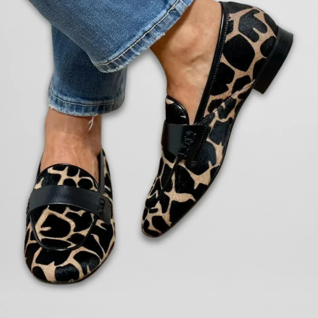 Women's Black Slip On Loafers with Cow Print | Grippy Sole and a Soft Closed Toe Fit for All Day Wear | Size 5.5-8